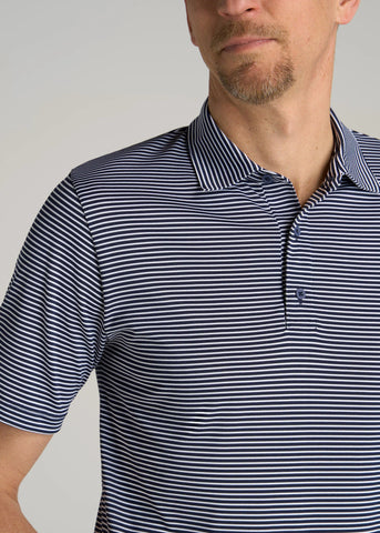 closeup of man wearing stretch stripe golf polo in blue stripe