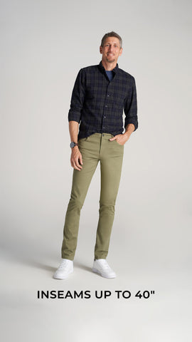 Man wearing khakis and button shirt. Image text: inseams up to 40"